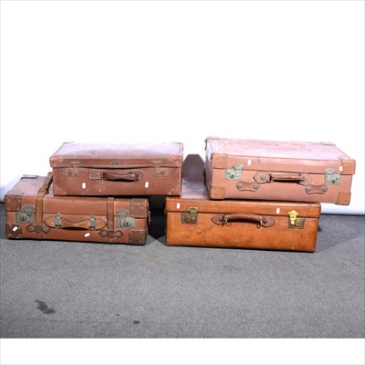 Lot 517 - A vintage leather suitcase, ...