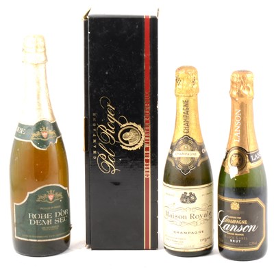 Lot 272 - Pol Roger Churchill 1982 cuvet, boxed, and three other bottles of champagne.