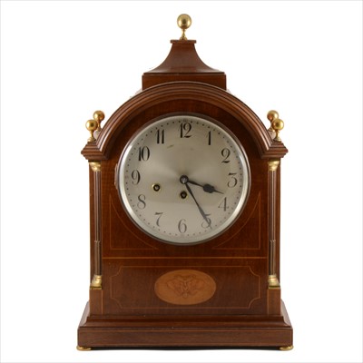 Lot 438 - An Edwardian inlaid mahogany mantel clock