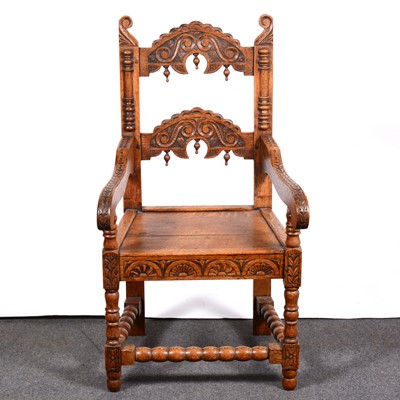 Lot 462 - A joined oak elbow chair, Derbyshire type, 20th century