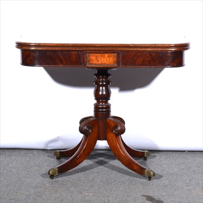 Lot 509 - A Regency mahogany foldover tea table, rounded...