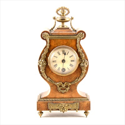 Lot 250 - A French Empire style stained walnut and gilt metal mantel clock, Lenzkirch ...