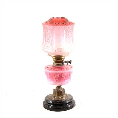 Lot 267 - An oil lamp, adapted as a table lamp, ...