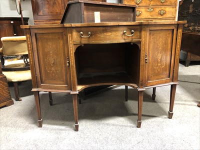 Lot 643 - Edwardian mahogany serpentine sideboard