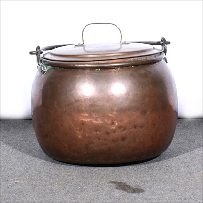 Lot 636 - A large copper cauldron