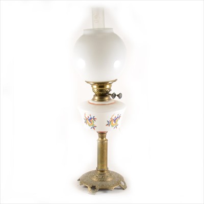 Lot 168 - A cast brass and opaque glass oil lamp, conceivably Russian