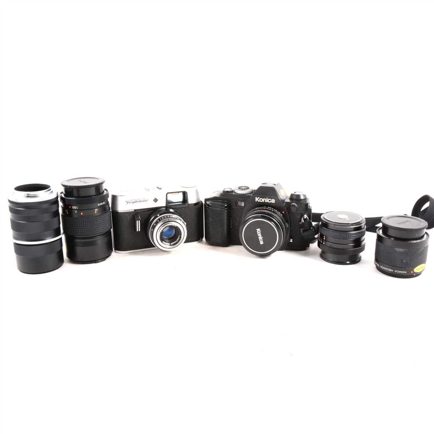 Lot 118 - Konica FS-1 SLR camera, with associated lenses, and another camera