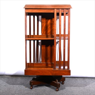 Lot 591 - An Edwardian mahogany revolving bookcase, the...