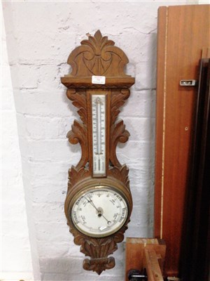 Lot 715 - Carved oak aneroid barometer