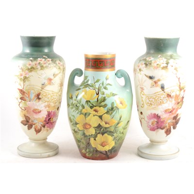 Lot 35 - Pair of Victorian enamelled opaque glass vases, and a painted British pottery vase
