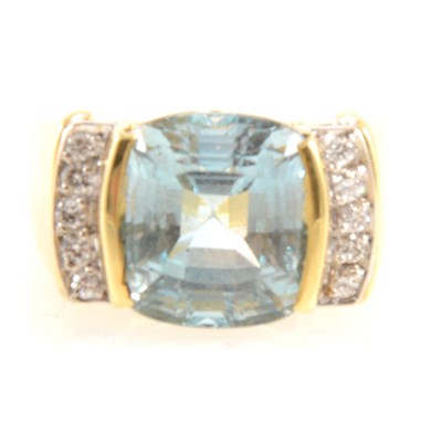 Lot 274 - A blue topaz and diamond ring.