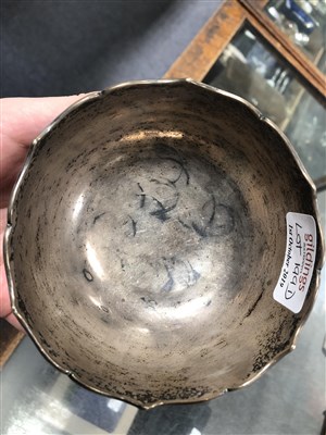 Lot 136 - A Chinese export white metal bowl, marked Shing Fat
