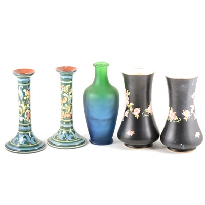 Lot 56 - A quantity of ceramic candlesticks and vases.