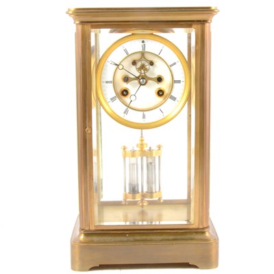 Lot 134 - A French brass four-glass mantel clock, ...
