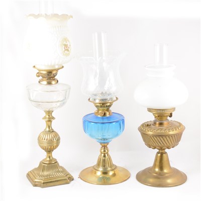 Lot 292 - A brass oil lamp, clear glass reservoir, ...