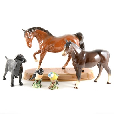 Lot 12 - Two Beswick horses, two Beswick birds and a Royal Doulton dog.