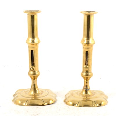 Lot 175 - Pair of George III brass candlesticks with...