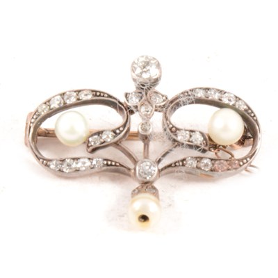 Lot 400 - A pearl and diamond brooch.