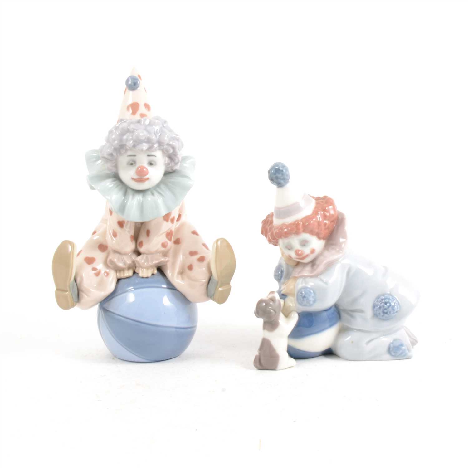 Lot 3 - Two Lladro figures of clowns, ...