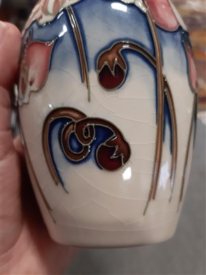 Lot 7 - A Moorcroft vase, decorated with lilies, ...