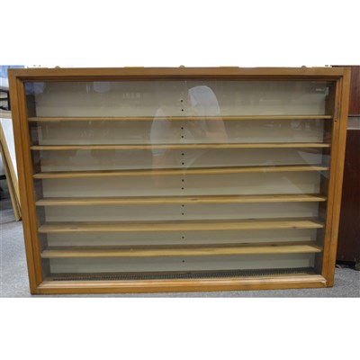 Lot 449 - A modern stained pine wall hanging display cabinet, ...