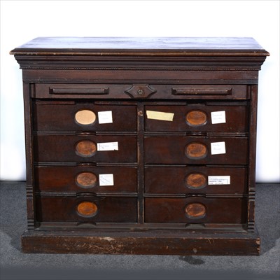 Lot 521 - A walnut and stained wood Auberg filing cabinet