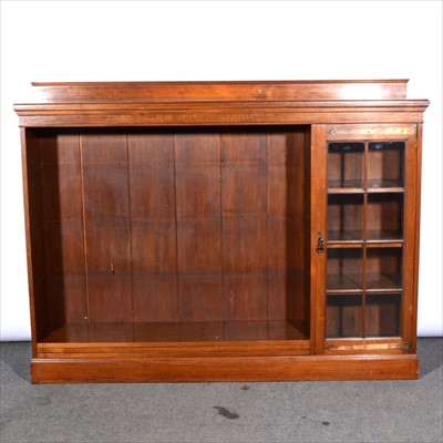 Lot 566 - An Edwardian walnut bookcase, with adjustable...