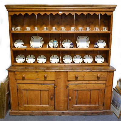 Lot 519A - An old pine dresser base, with matched three-shelf delft rack