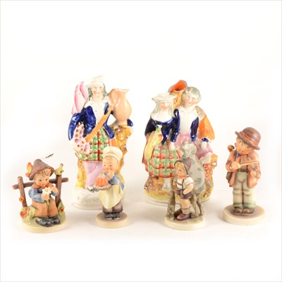 Lot 73 - A small collection of nine Hummel figures, three Staffordshire flat-back figures...