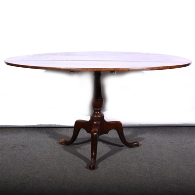 Lot 553 - A Georgian mahogany breakfast table, oval top, ...