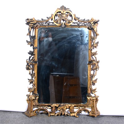 Lot 437 - A Rococo inspired ebonised and parcel gilt pier glass, probably 19th Century, ...