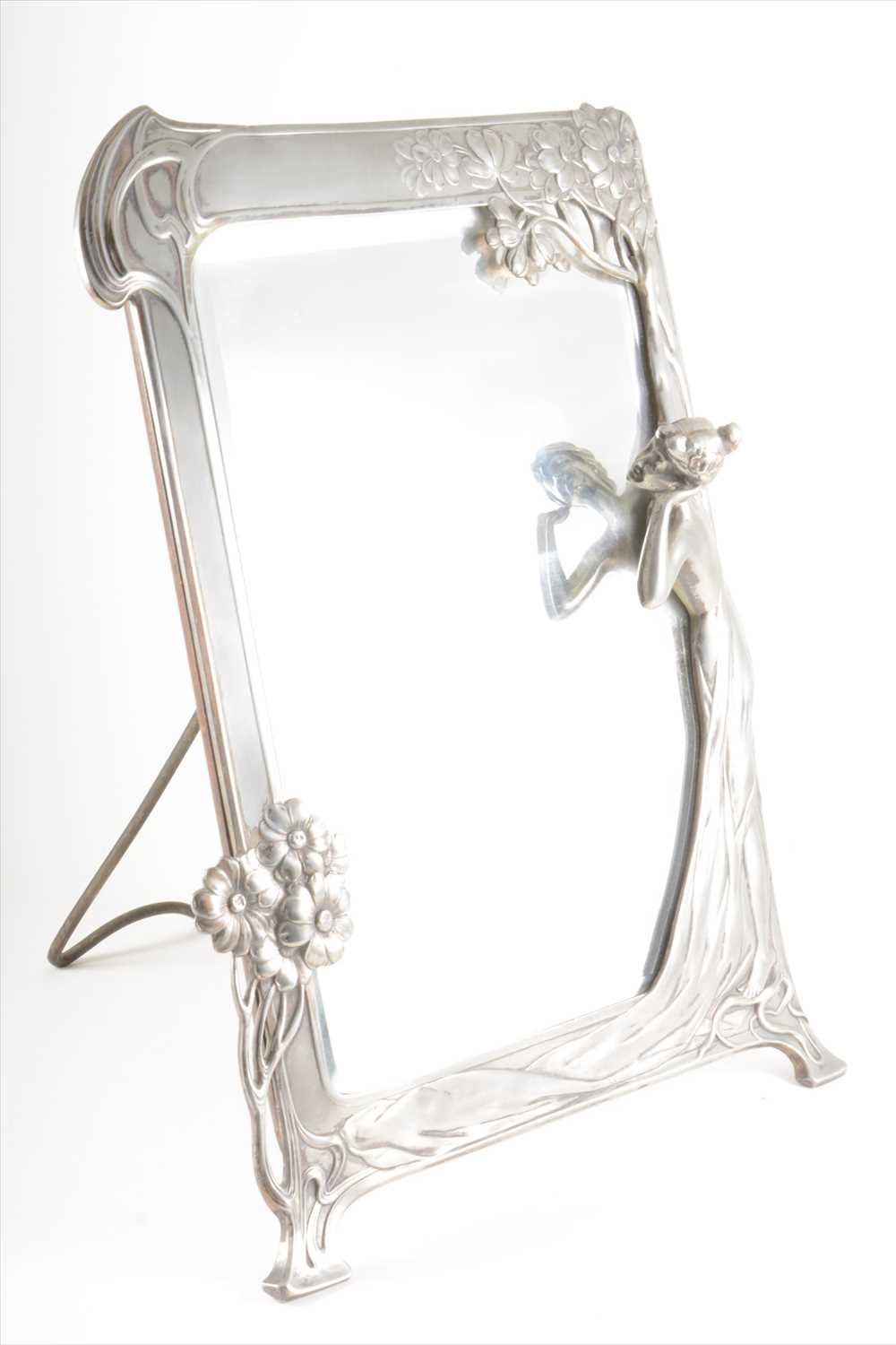 Lot 95 - An Art Nouveau polished pewter figural mirror, by WMF, circa 1905.