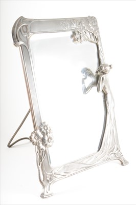 Lot 95 - An Art Nouveau polished pewter figural mirror, by WMF, circa 1905.