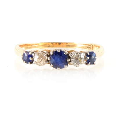 Lot 206 - A sapphire and diamond five stone ring.