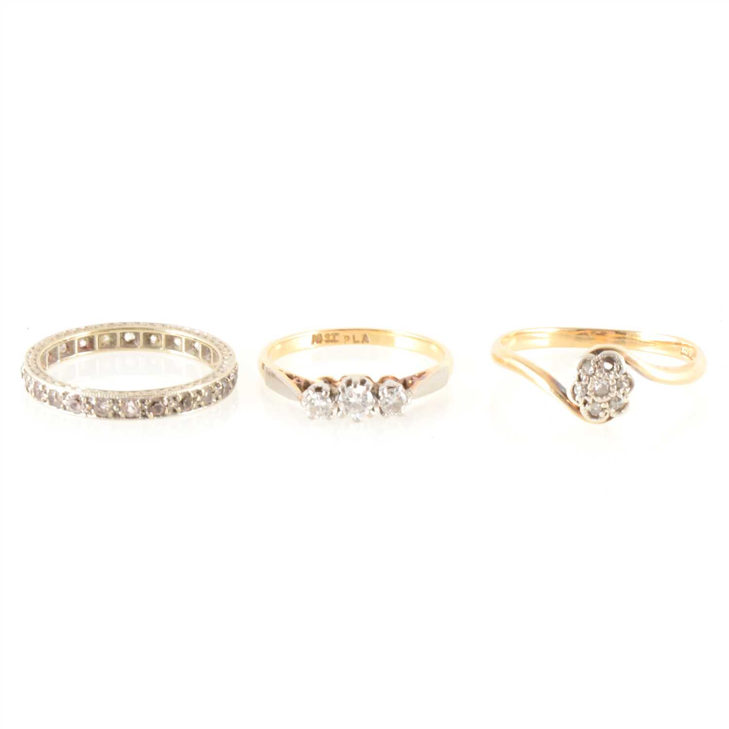 Lot 151 - Two diamond rings and an eternity ring.