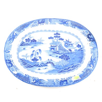 Lot 80 - Ironstone blue and white Willow pattern meat-plate, and another.
