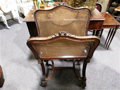 Lot 652 - French walnut and cane panelled folio stand