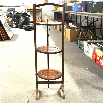 Lot 495 - A mahogany three-tier folding cake stand,  ...