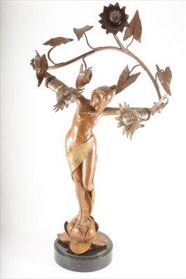 Lot 116 - An Art Nouveau patinated spelter figural lamp, signed L Beck, circa 1900.