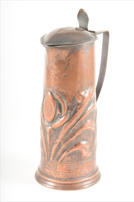 Lot 73 - An Arts and Crafts coppered metal hot water jug, circa 1900.
