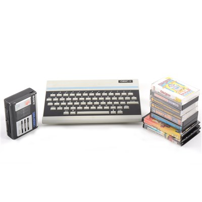 Lot 161 - Oric-1 vintage personal computer, with a small selection of cassette games, and a Sony Walkman WM-33, (no headphones).