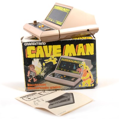 Lot 191 - Cave Man by Grandstand table top mini arcade electronic game, boxed with instructions.
