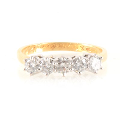 Lot 197A - A diamond five stone ring.