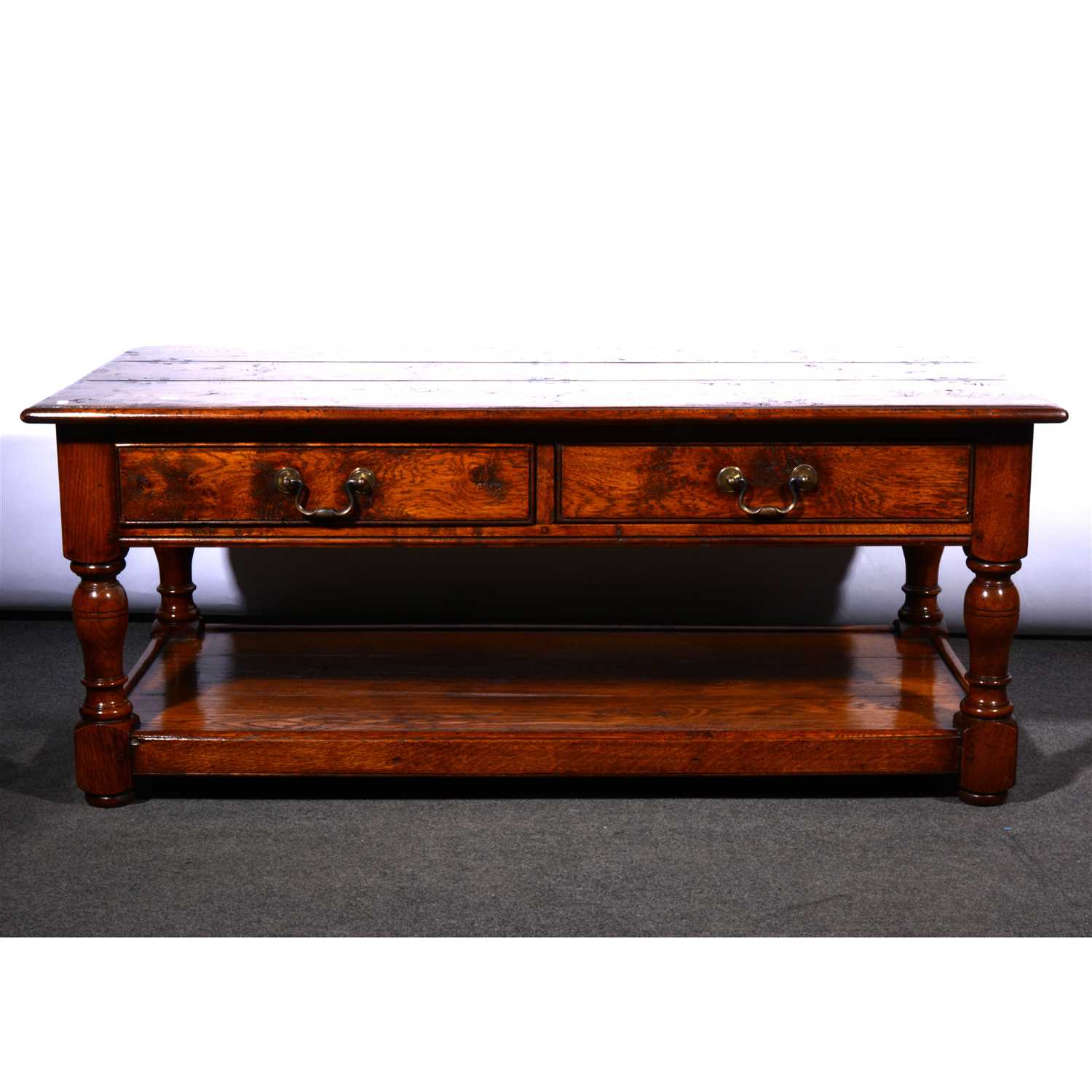 Lot 690 - A Golden oak coffee table