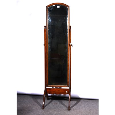 Lot 691 - An oak cheval mirror