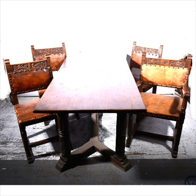 Lot 410 - A reproduction carved oak dining room suite