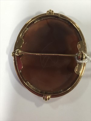 Lot 653 - A cameo brooch in 9 carat yellow gold handmade mount.