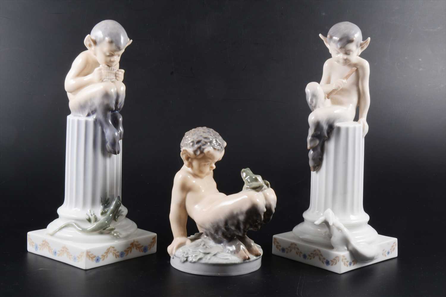 Lot 149 - Three hard-paste porcelain 'Faun' figures, by Royal Copenhagen.
