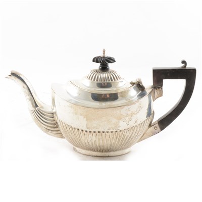 Lot 421 - A silver George V bachelor teapot