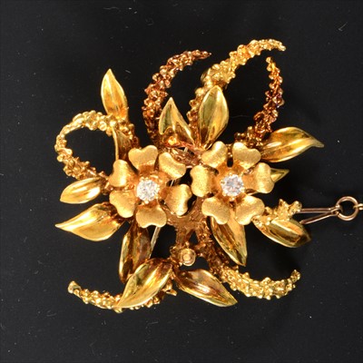 Lot 306 - An 18 carat yellow gold diamond set brooch.